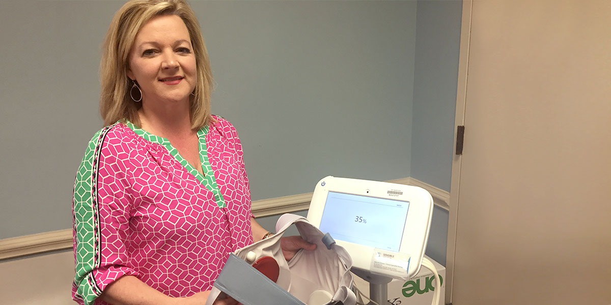 Heather Young, RN, manager of the Spartanburg Regional Heart Failure Center, holds a ReDS System – a vest with technology that quickly produces a measurement of fluid in the lungs. 