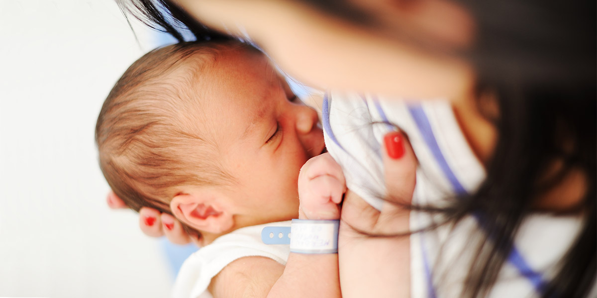 Mother Breastfeeding her newborn baby