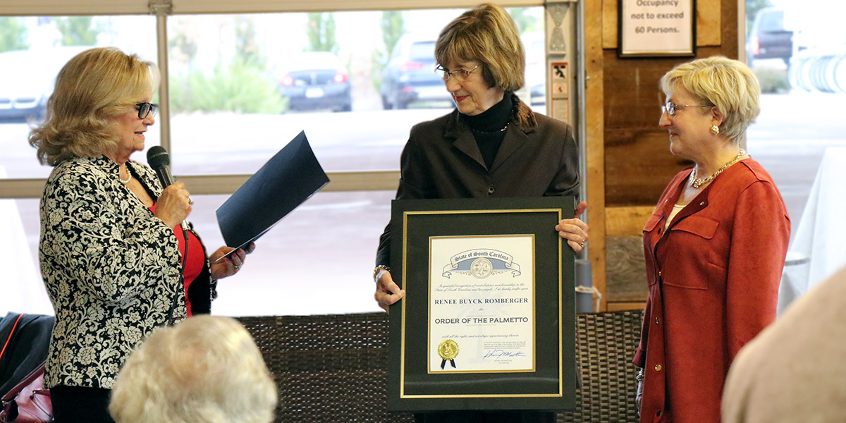 Renee Romberger being presented with the Order of the Palmetto by South Carolina Representative Rita Allison on behalf of Governor Henry McMaster