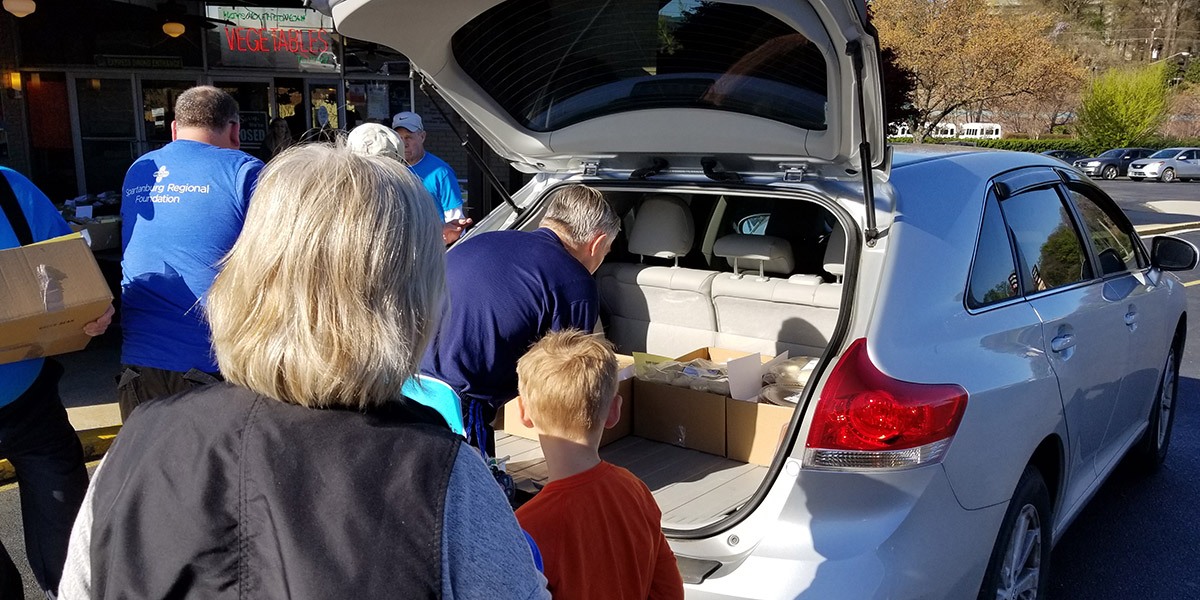 Volunteers preparing to deliver meals throughout our community to Spartanburg Regional Hospice patients and their families