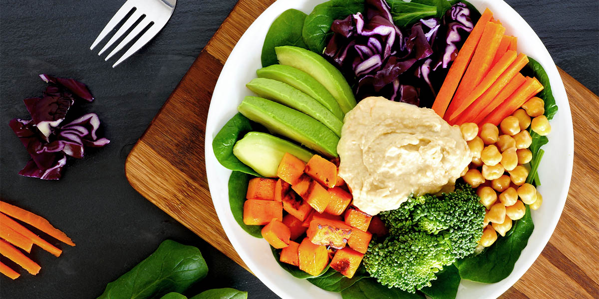 Healthy bowl with super-foods on slate background