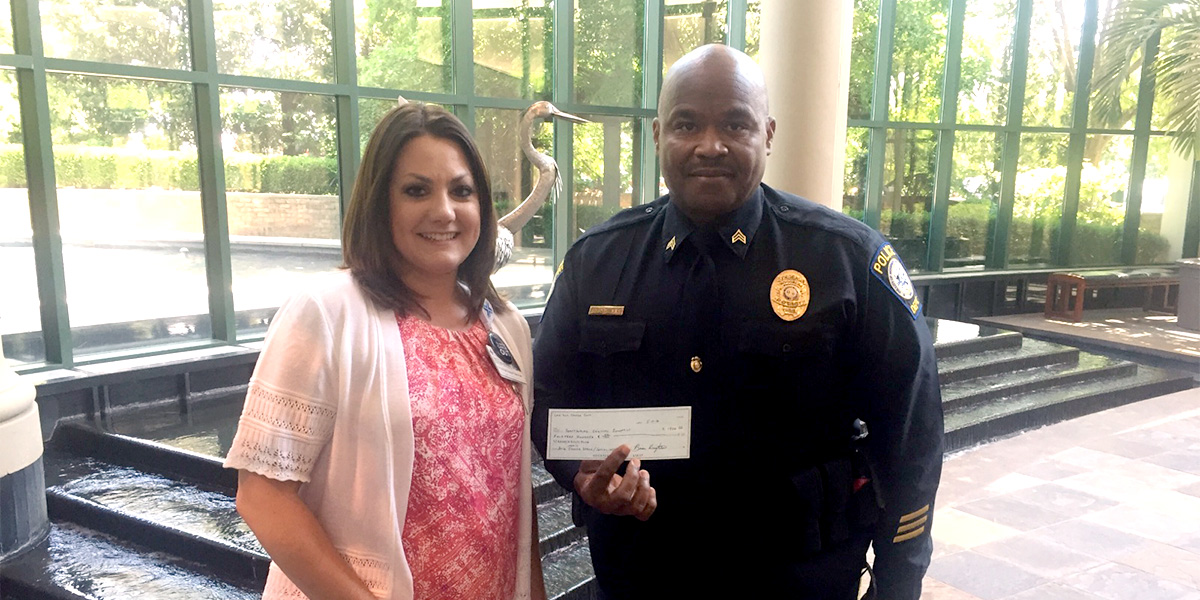 Sgt. Darrell Dawkins presented $1,400 to Gibbs Cancer Center & Research Institute for the cancer special needs fund