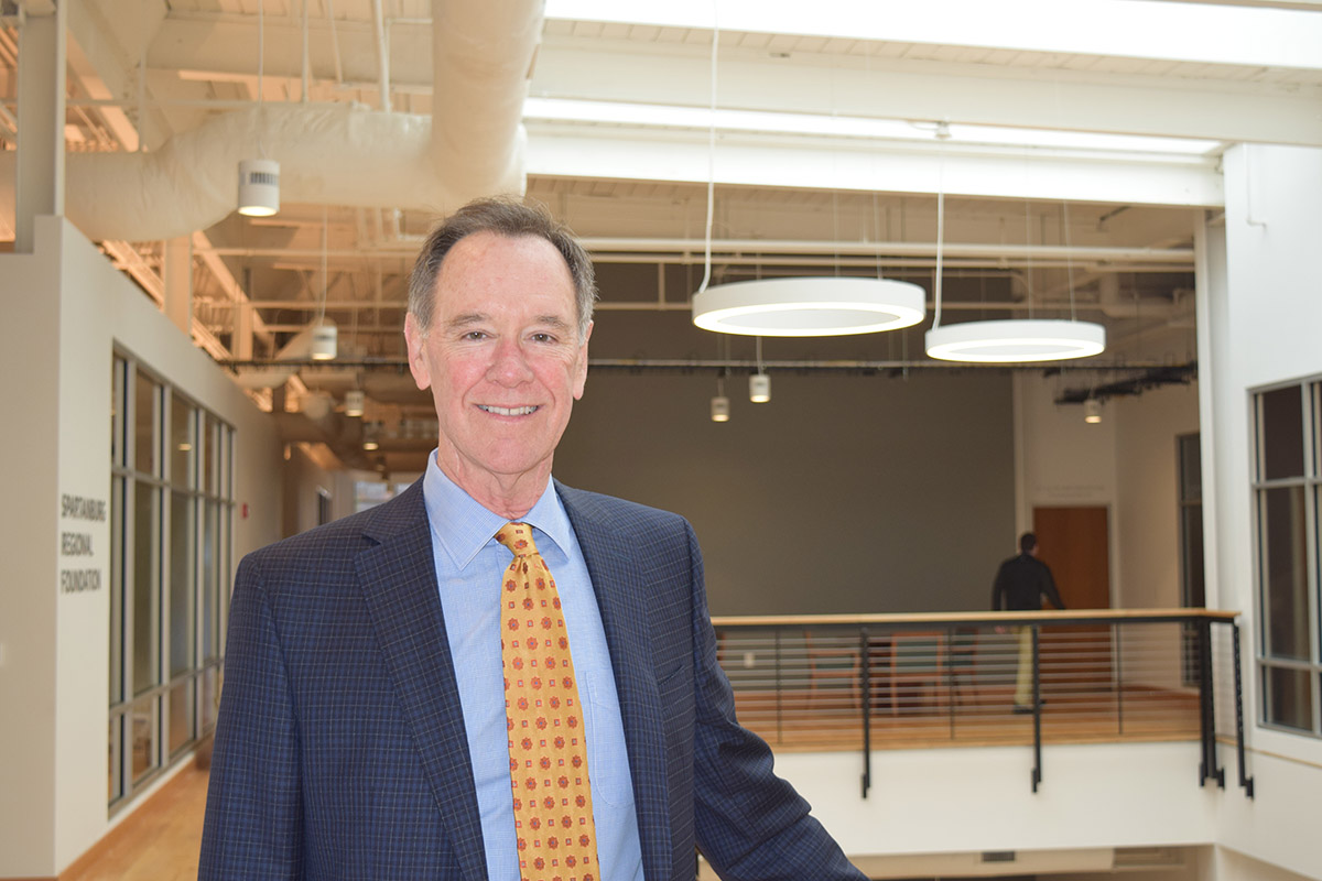 A photo of local restauranteur, Bill Burton who received a Spartanburg Regional Foundation honor for his philantropic work, smiling at the camera.jpg