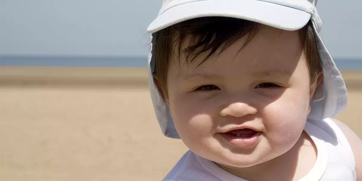 Sensible baby, sunhat and sunblock
