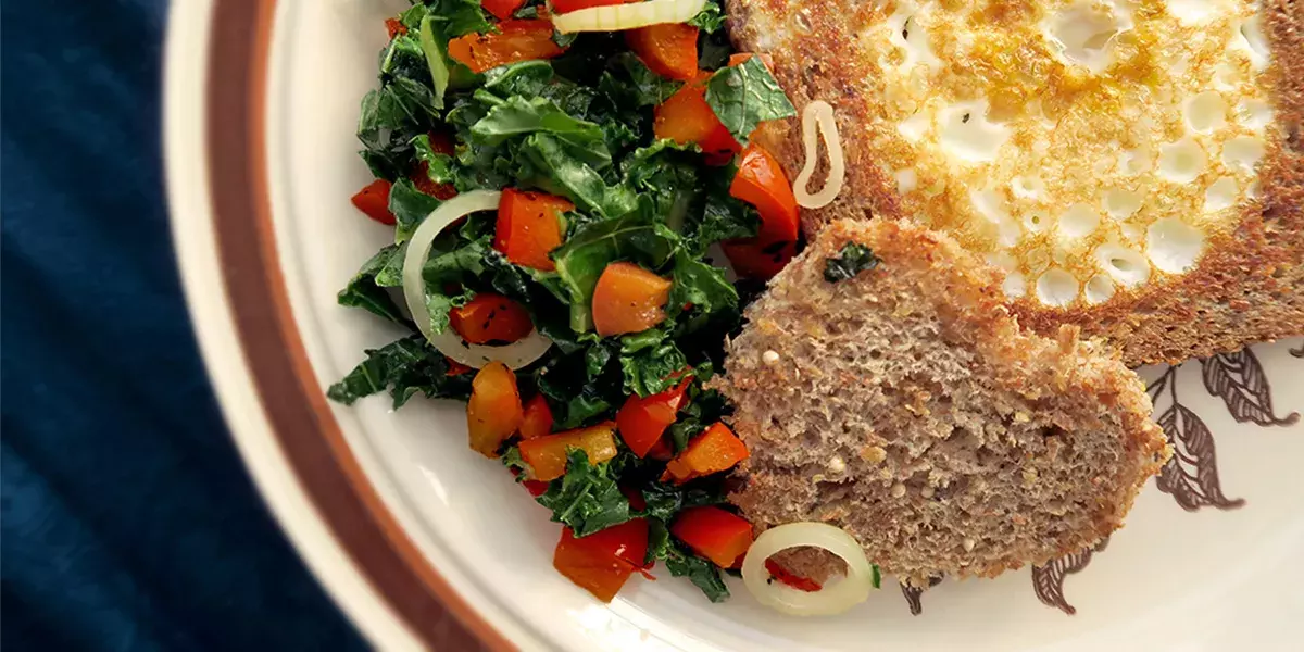 Egg-in-a-hole with kale